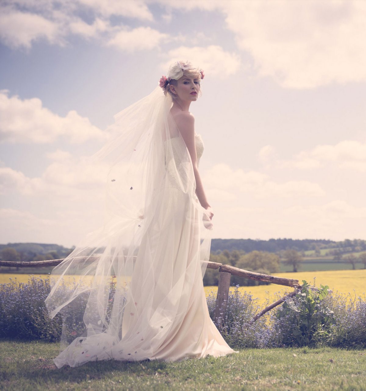 Professional photo of a bride standing in fields